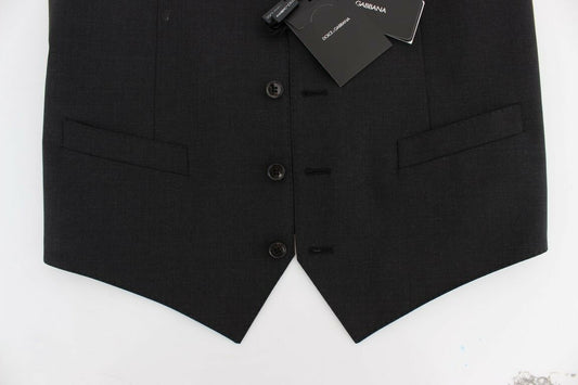 A gray wool blazer with black buttons and a tag attached to the front