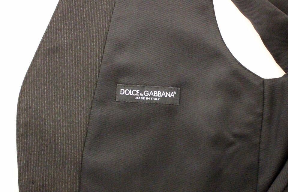 A gray wool vest with a stretchy fabric and the Dolce & Gabbana logo
