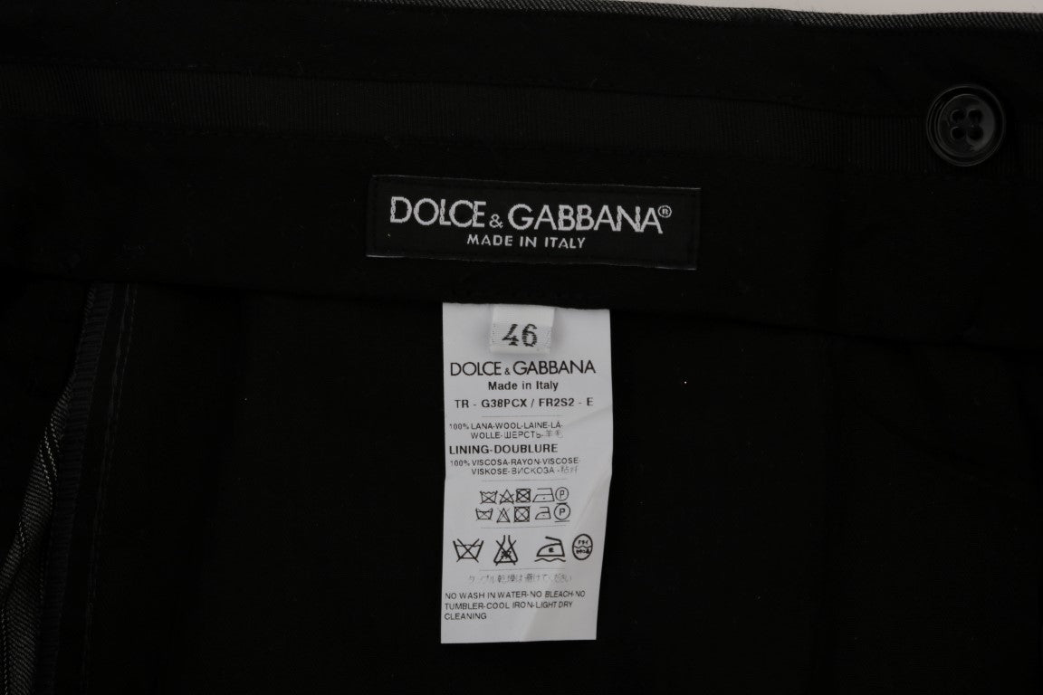 Black suitcase with white tag on front