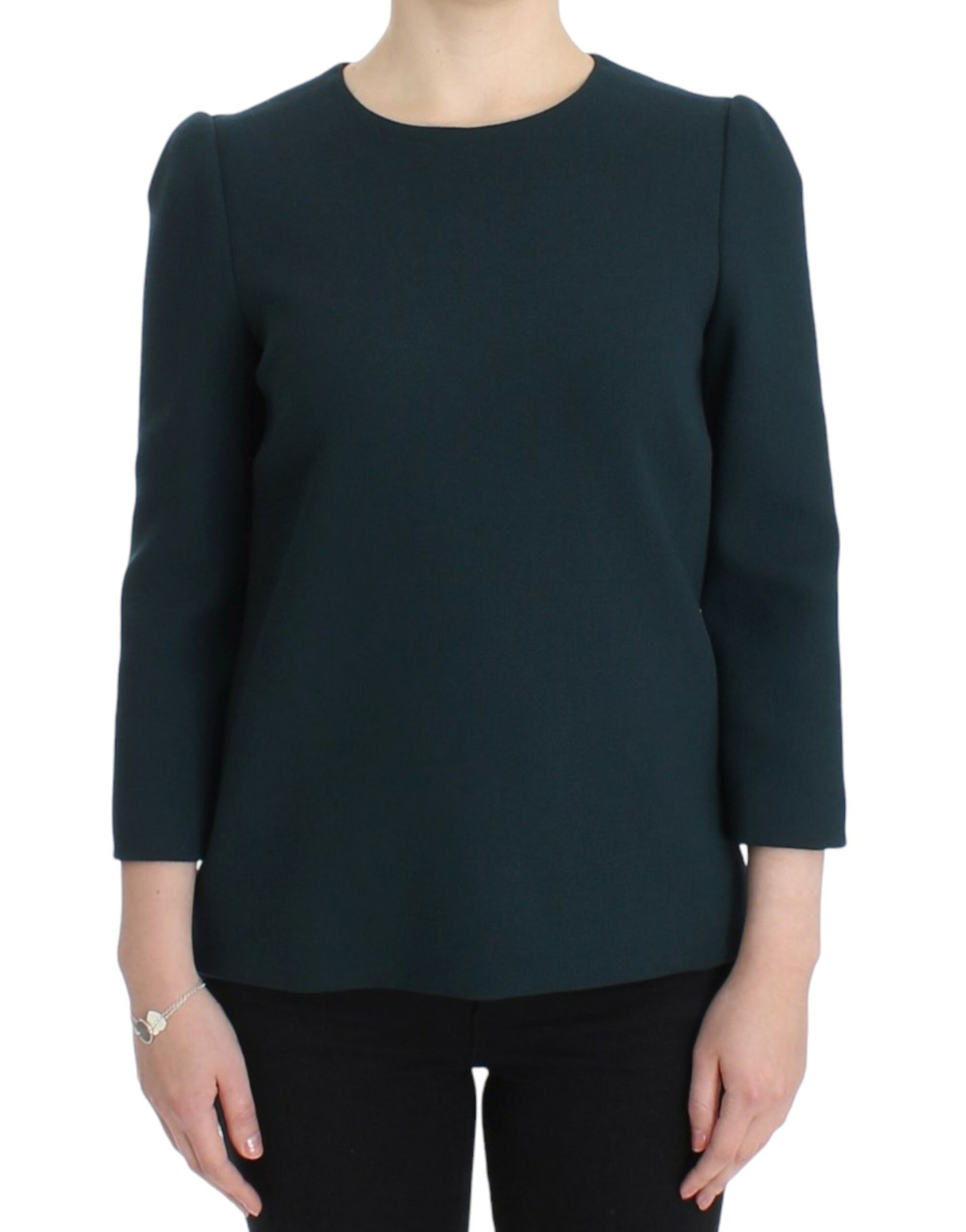 Woman wearing dark blazer with ruffled sleeves