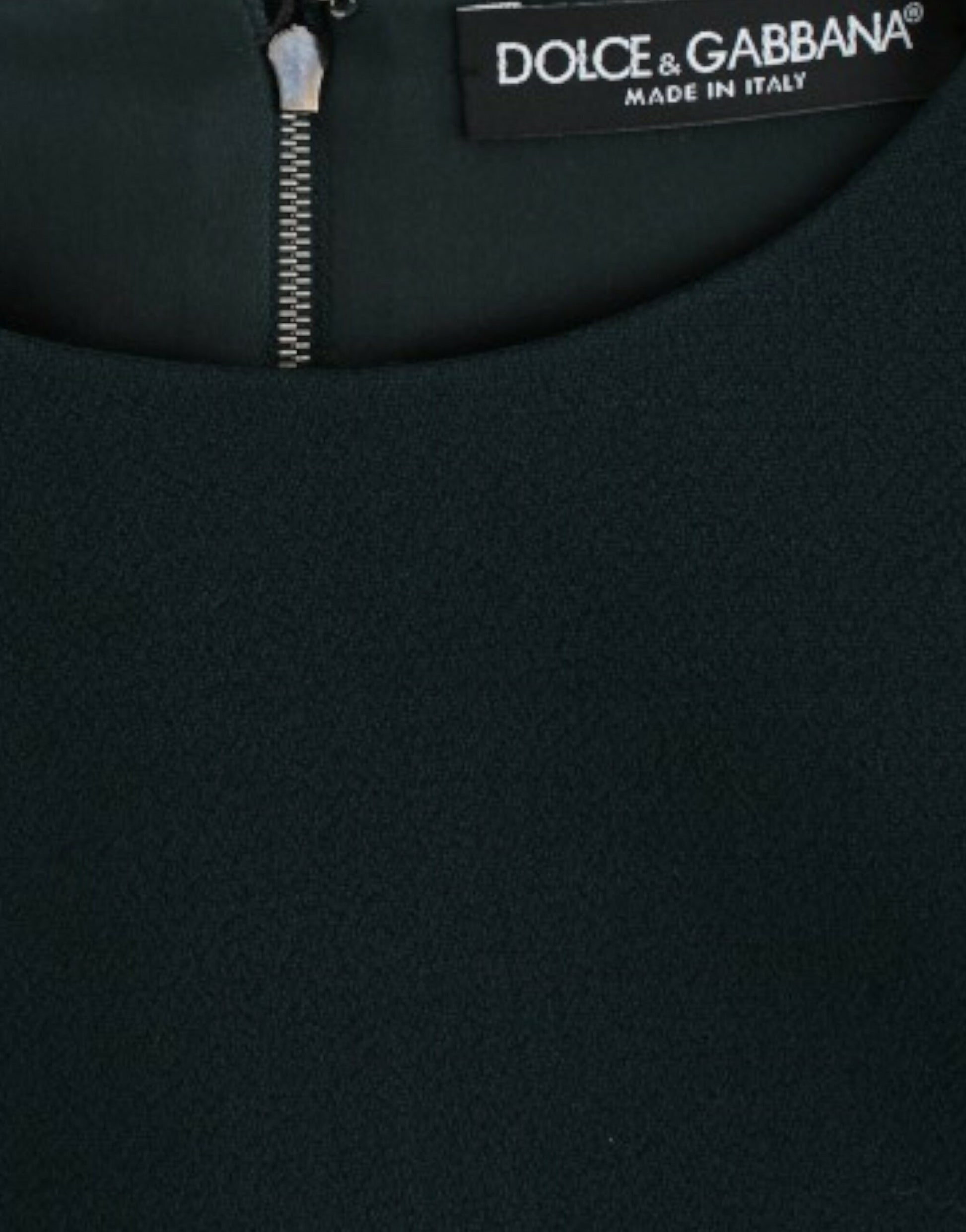 Zipper on front of black jacket