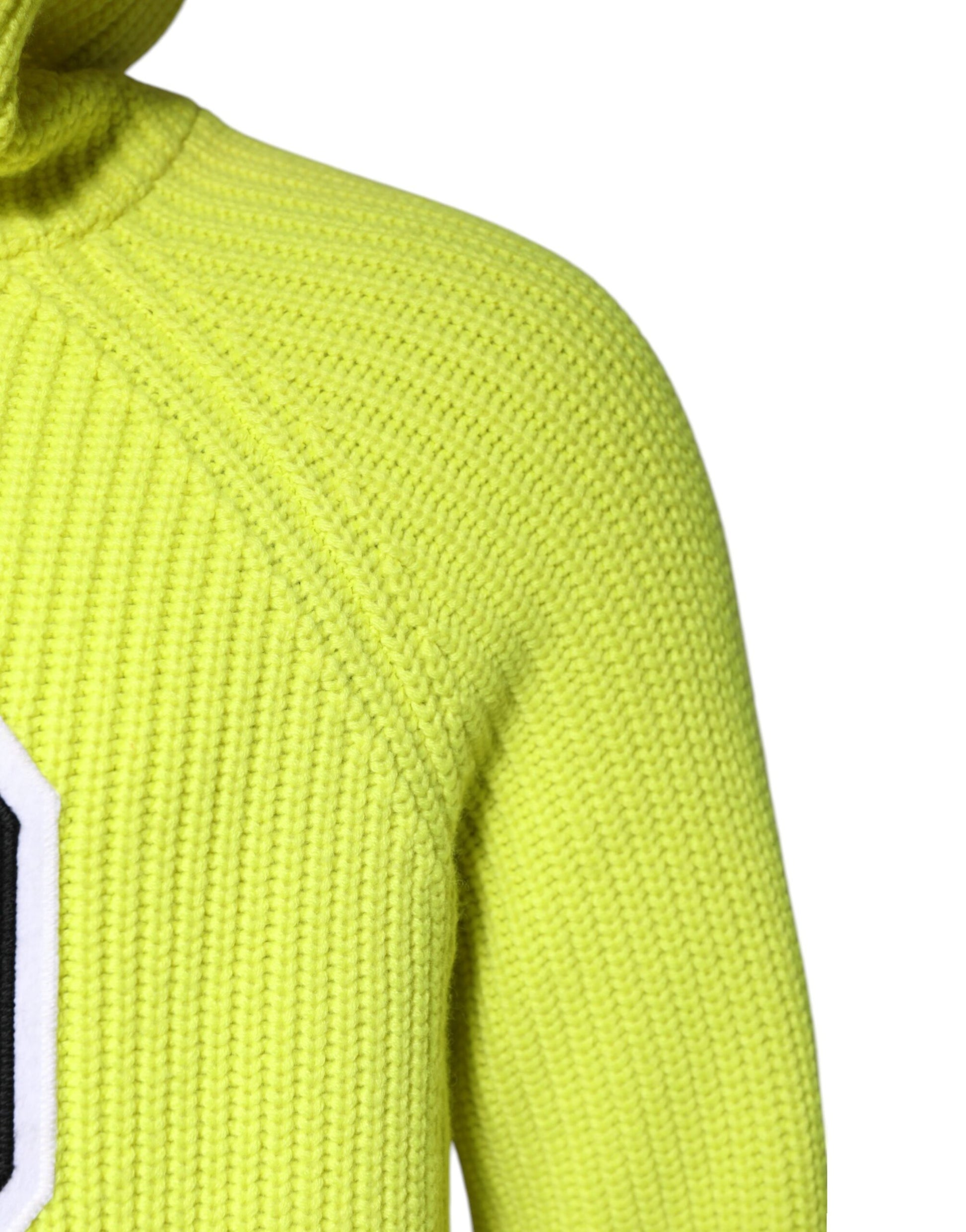 Yellow knit sweater with ribbed cuffs and hem