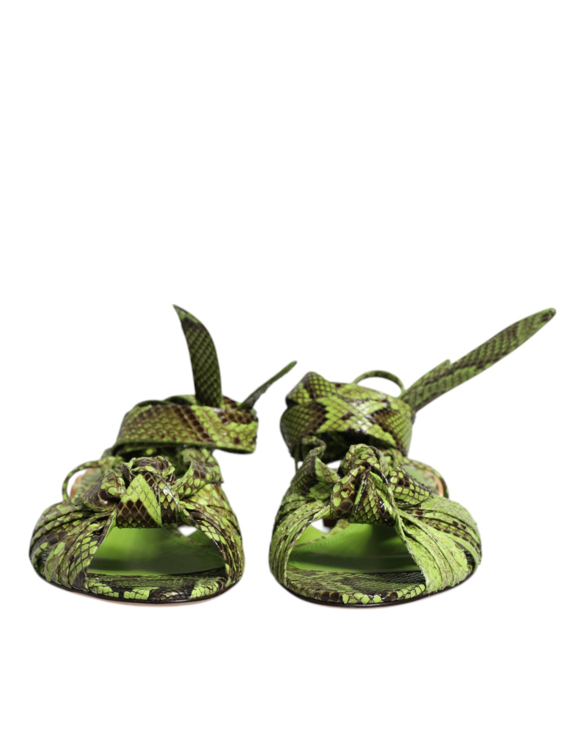 Pair of baby shoes with green camouflage pattern