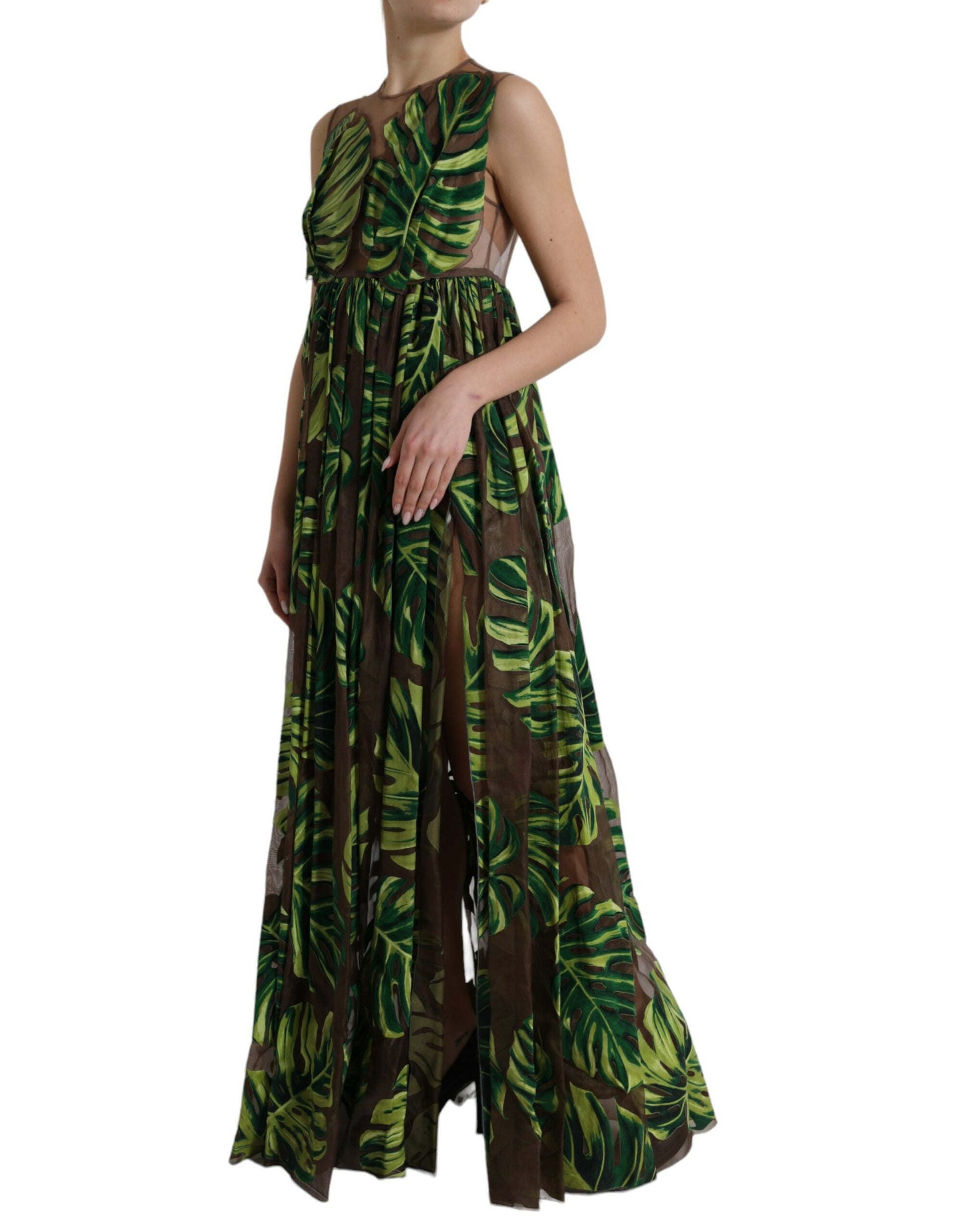 A long sleeveless maxi dress with a green banana leaf pattern