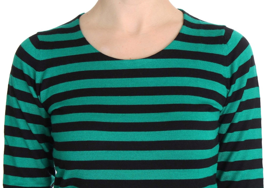Green and black striped sweater on a mannequin