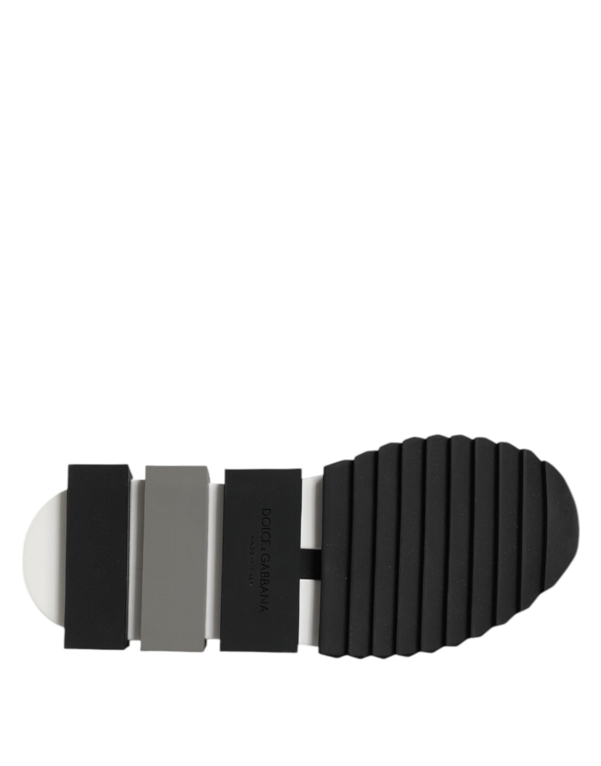 Footwear with black sole and gray straps