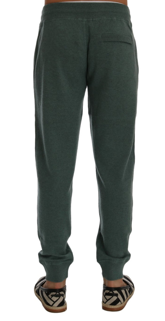 Pair of green sweatpants on a mannequin