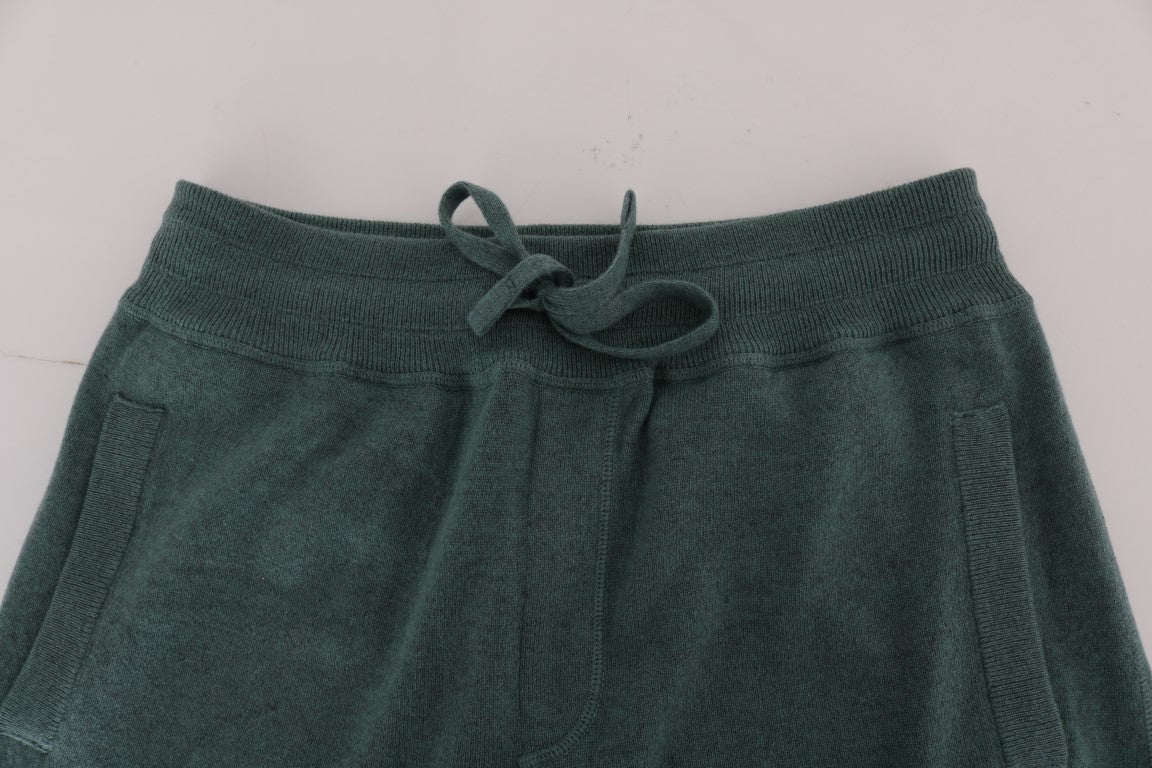 Pair of dark green knitted shorts with drawstring waistband