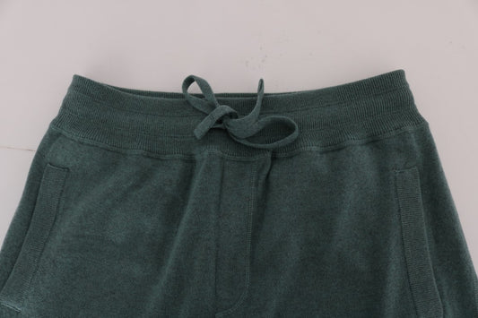Pair of dark green knitted shorts with drawstring waistband