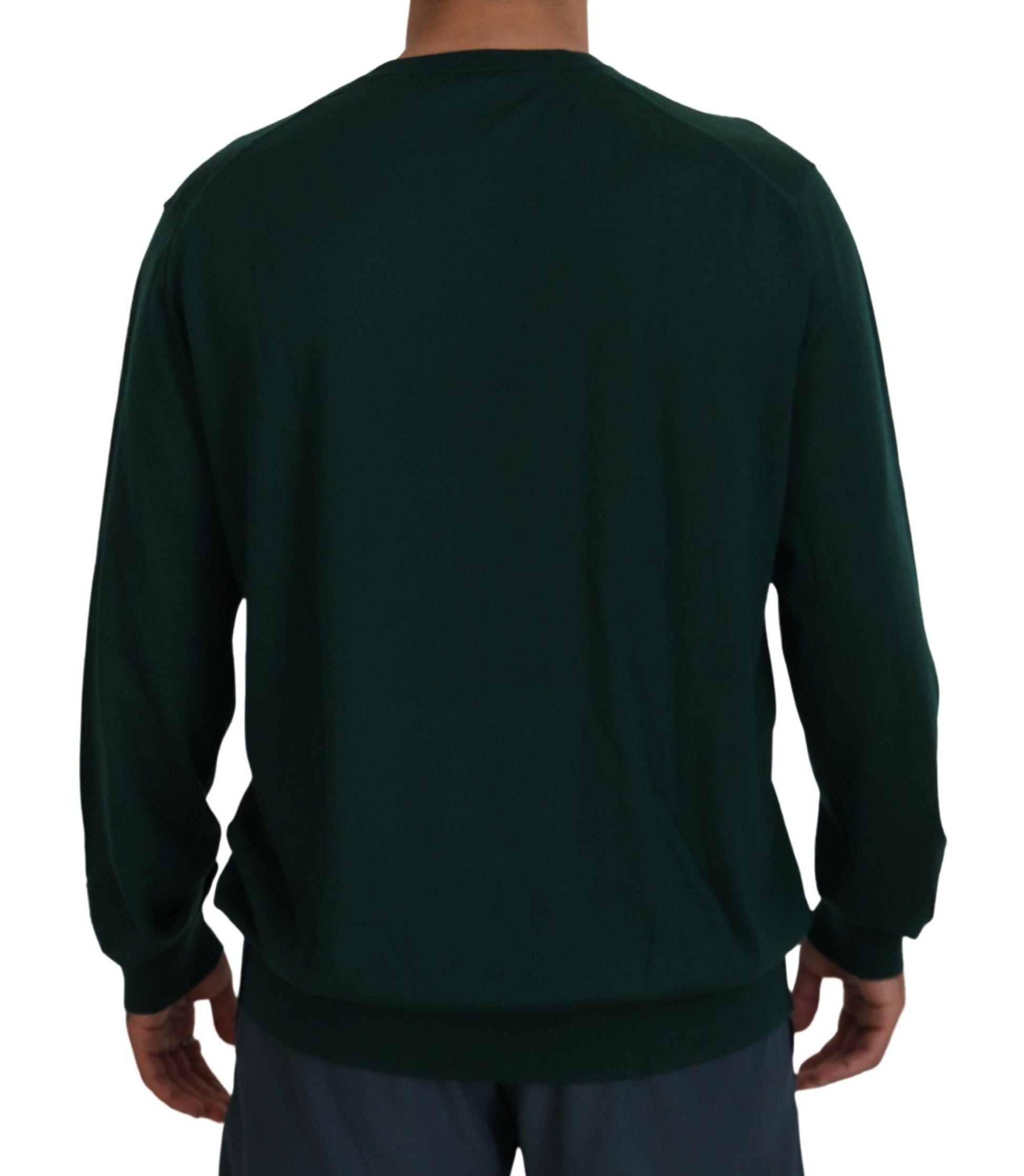 Long sleeve dark green shirt on a person's back