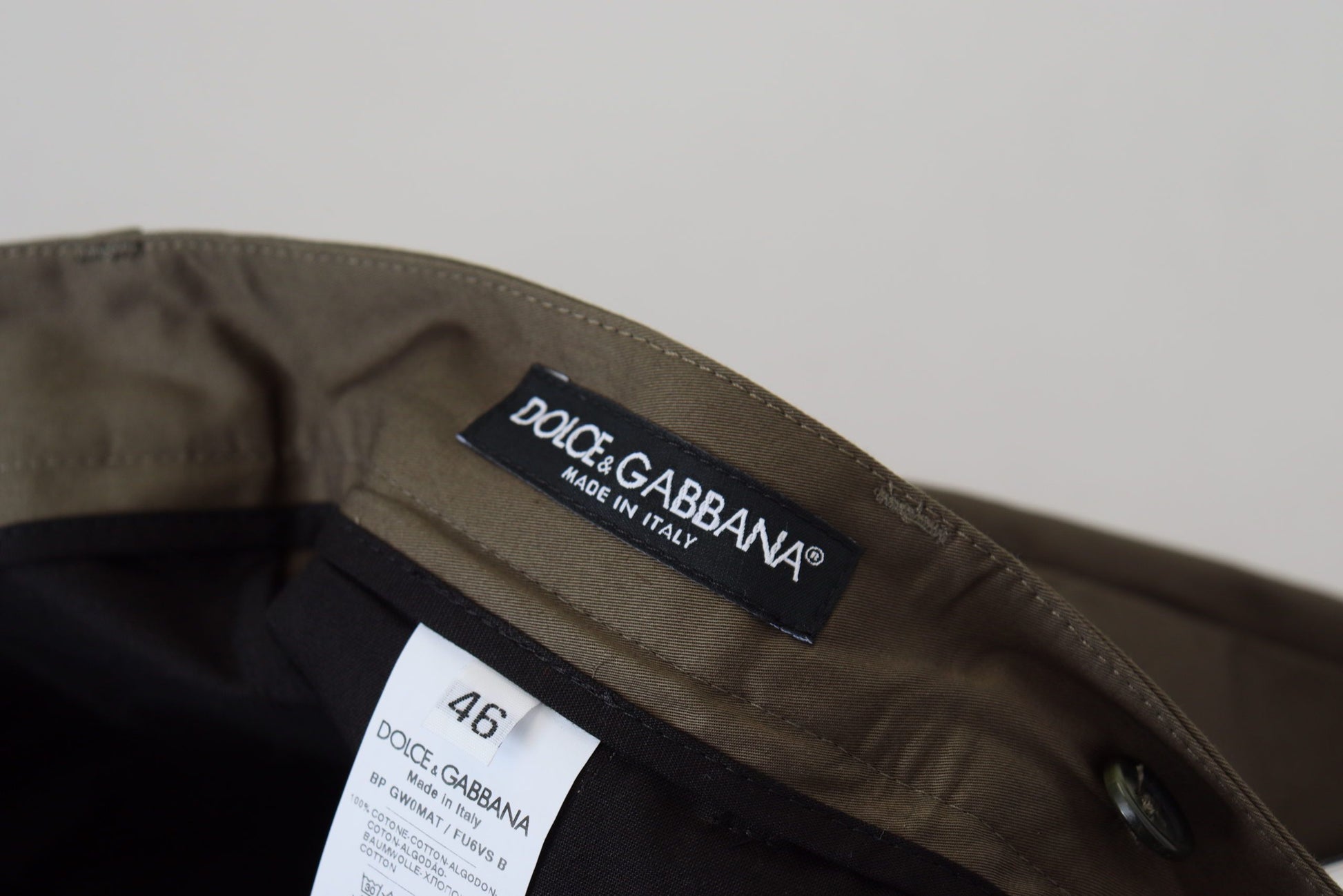 Brown jacket with black label on sleeve
