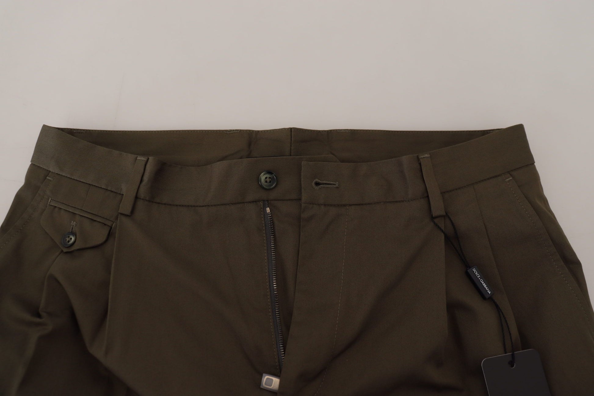 Pair of olive green cargo pants with zippered pockets