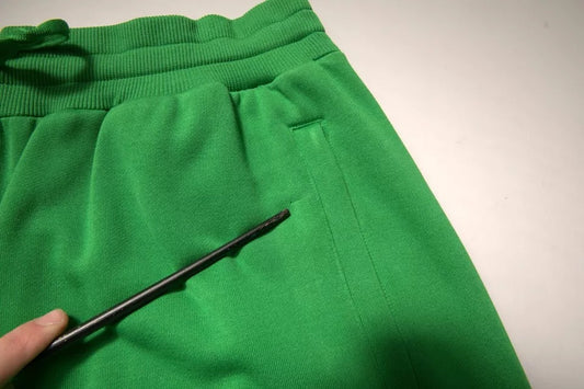 A pair of green cotton blend men's bermuda shorts