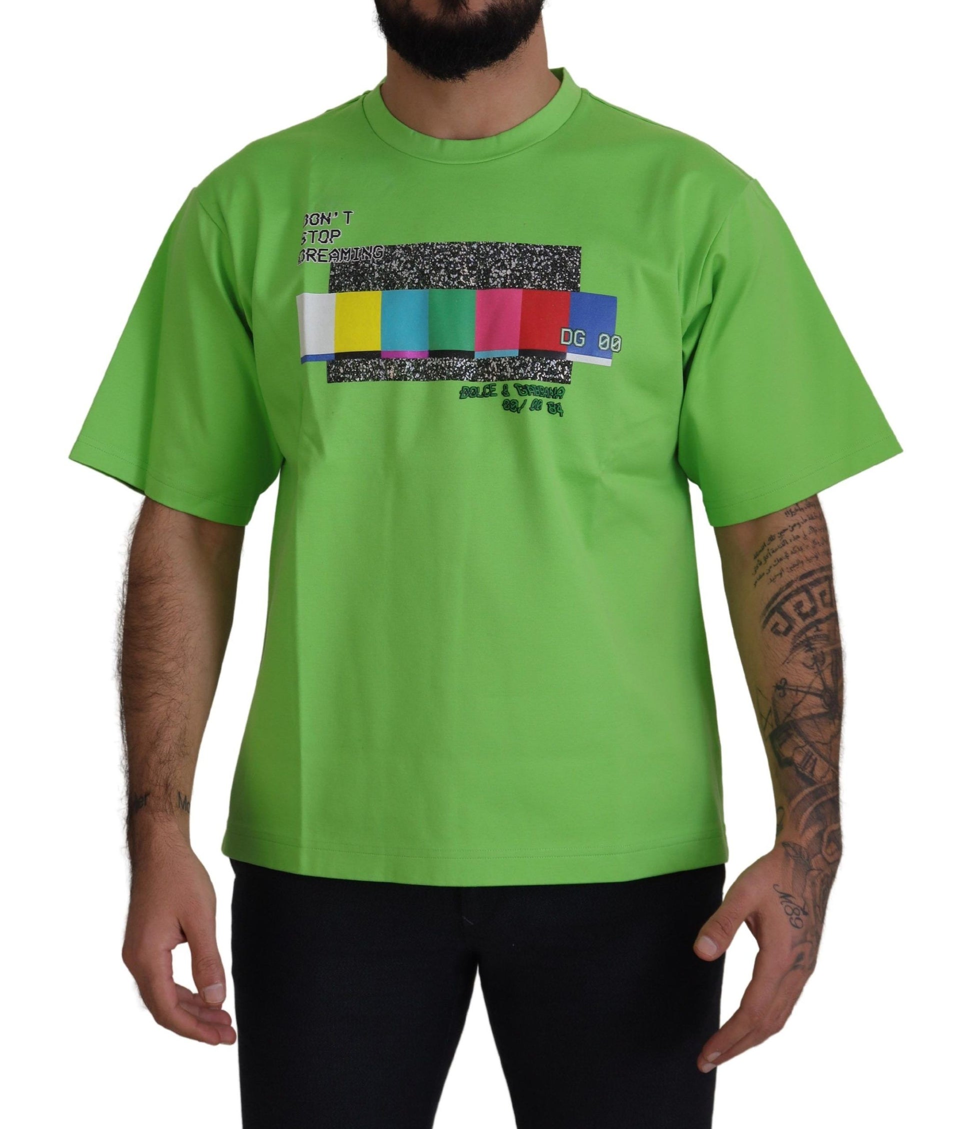 Green t-shirt with colorful design on front
