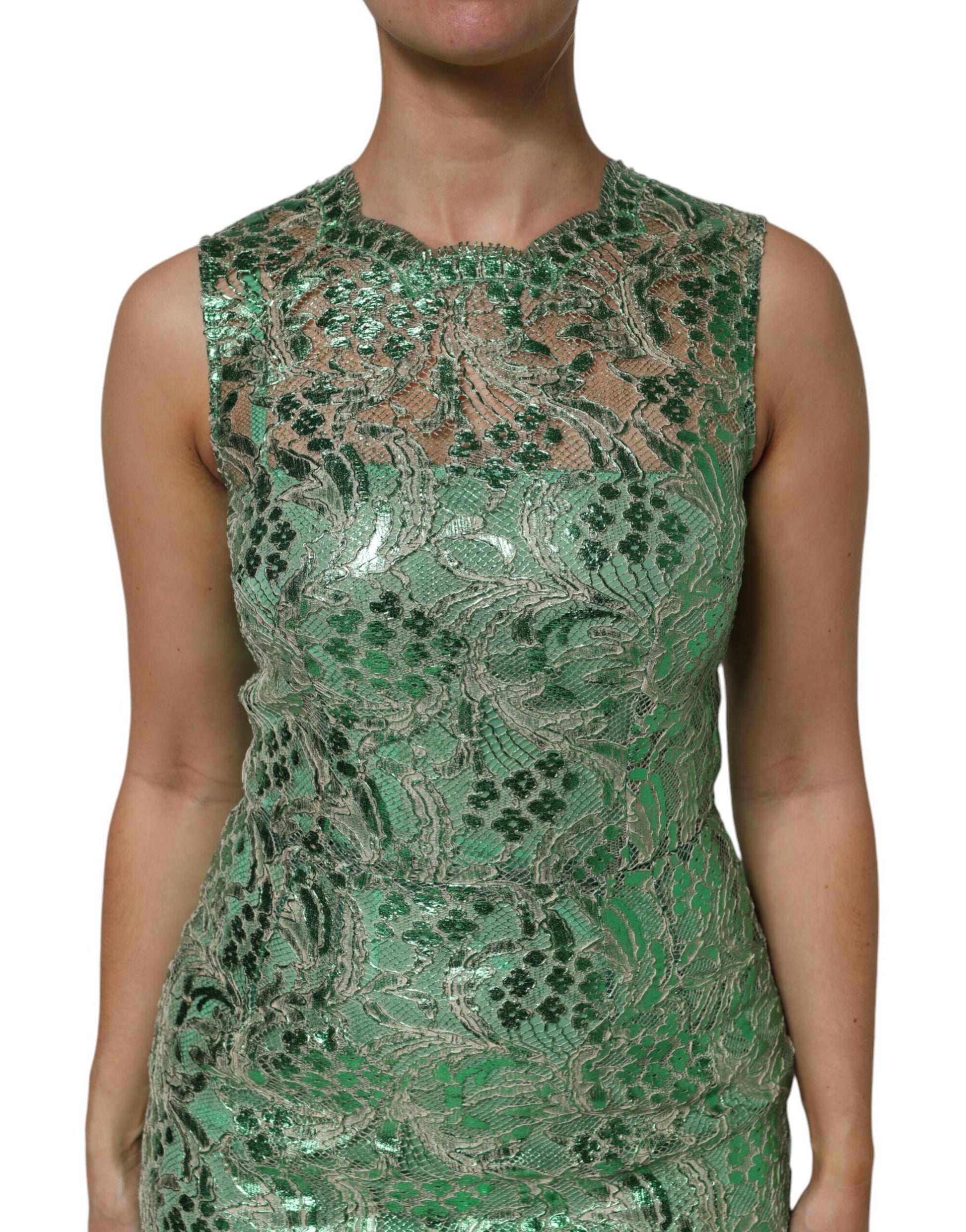 A green lace sheath dress with floral pattern, midi length, cotton fabric