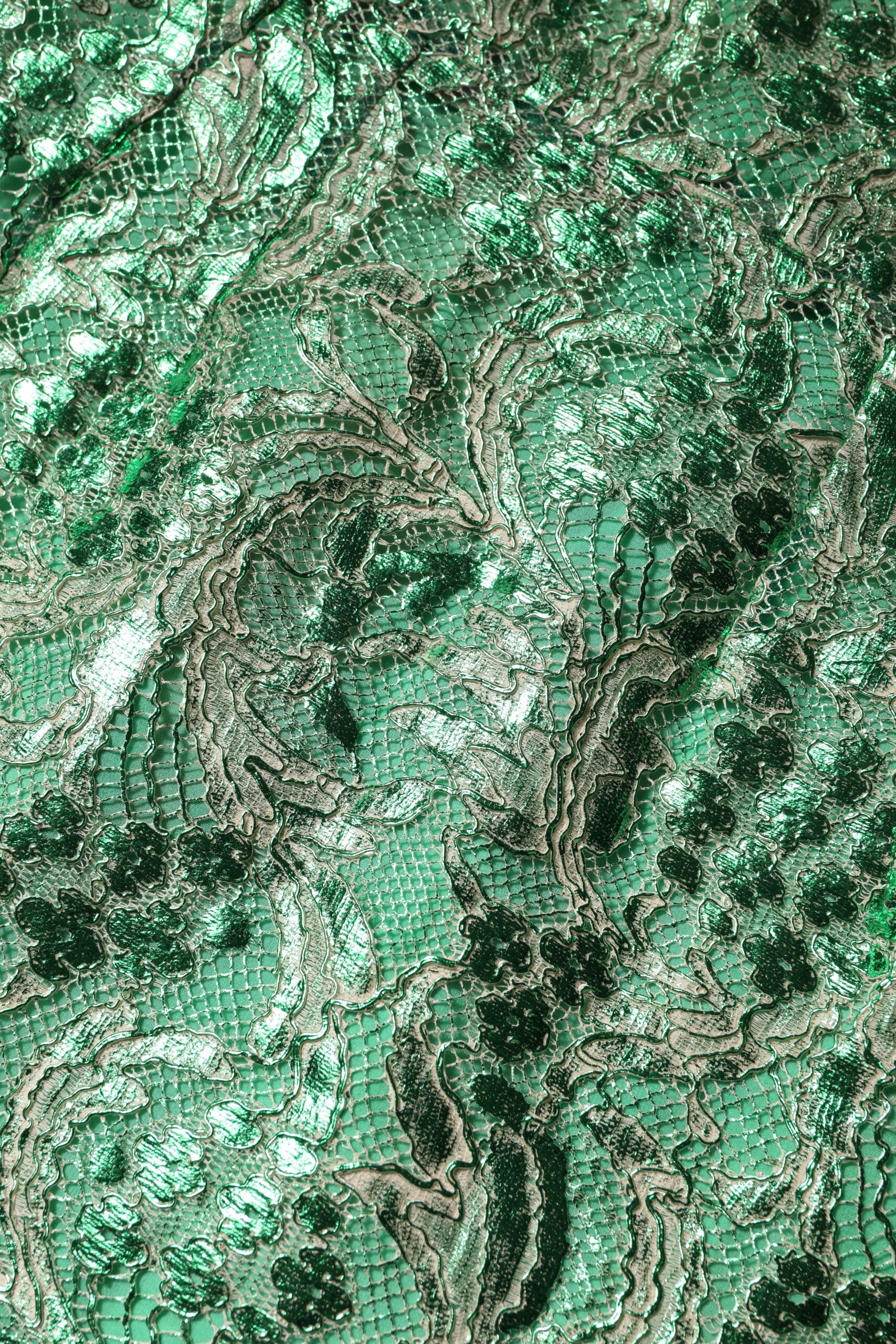 A green floral lace sheath midi dress by Dolce & Gabbana
