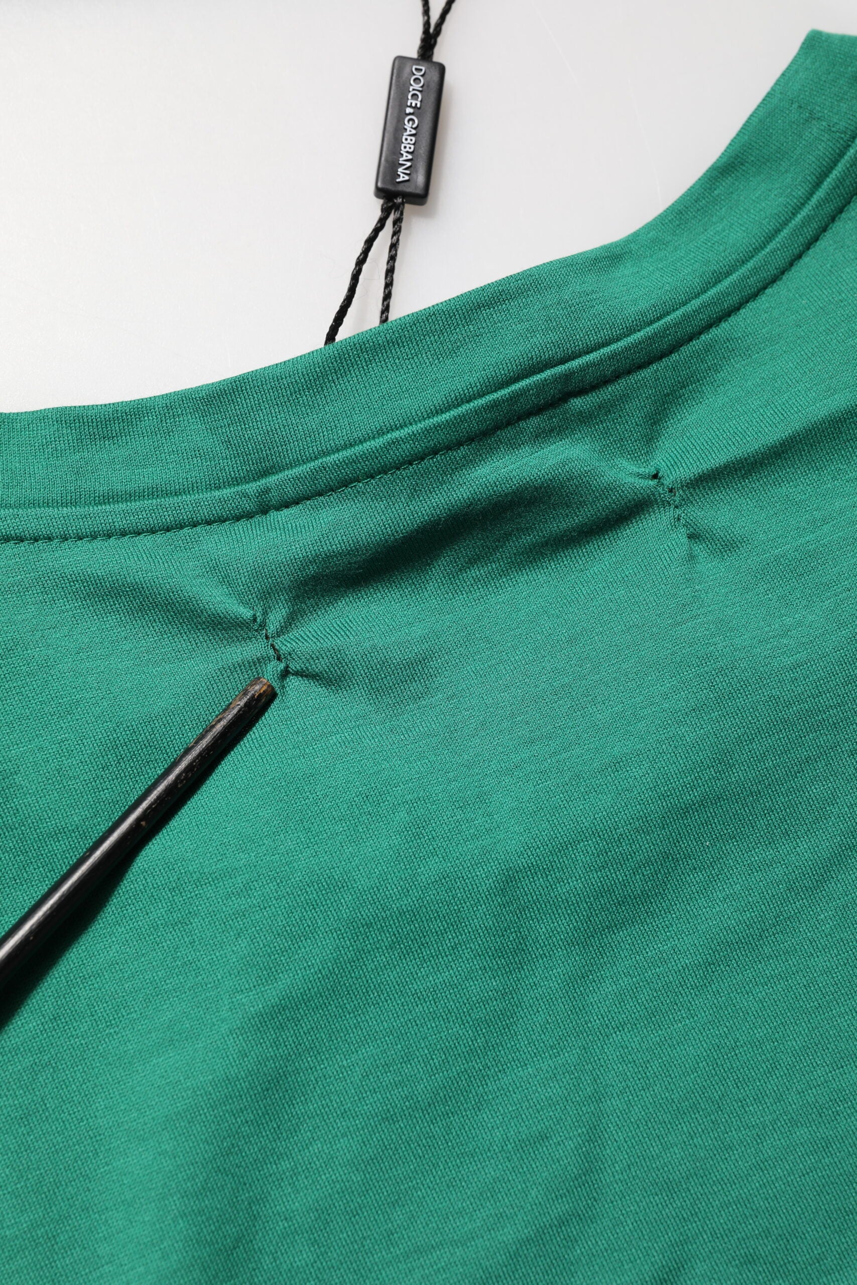 Green shirt on hanger