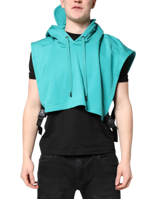 Man wearing a hoodie with a green towel draped over his shoulders
