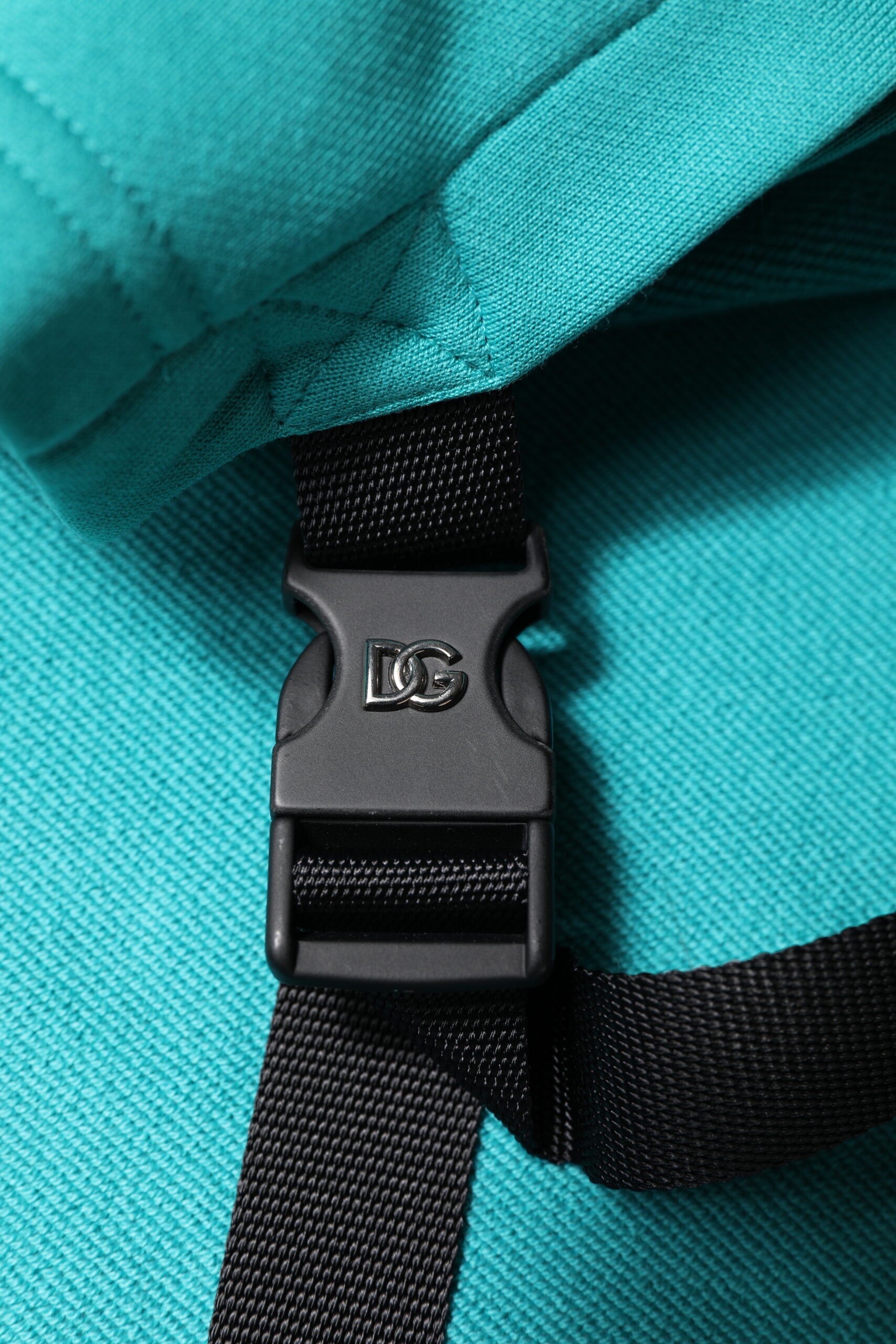 Backpack with black buckle and strap
