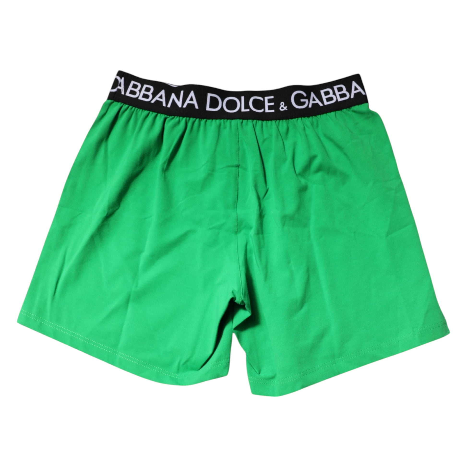 Pair of green men's boxer shorts with brand name on waistband
