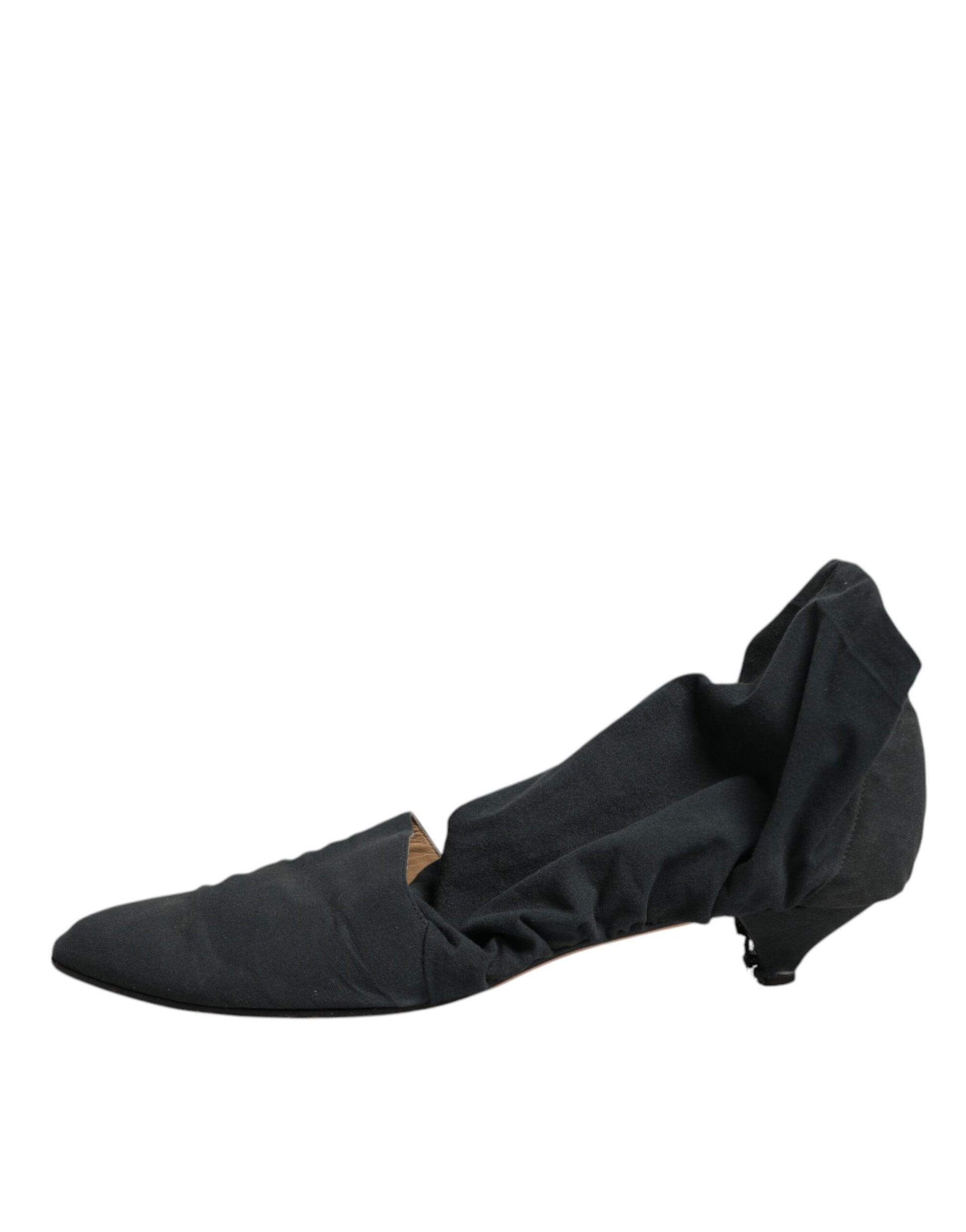 Black shoe with a cloth covering its toe