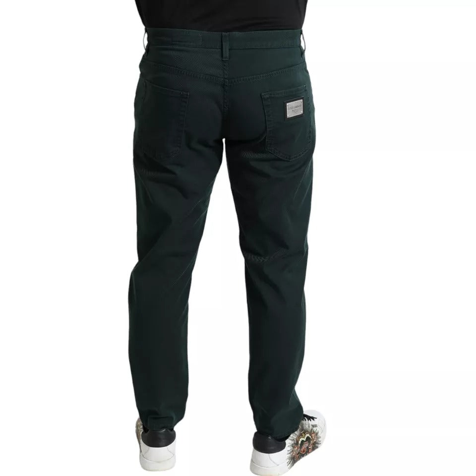 Pair of dark green cargo pants with a small white tag on the back