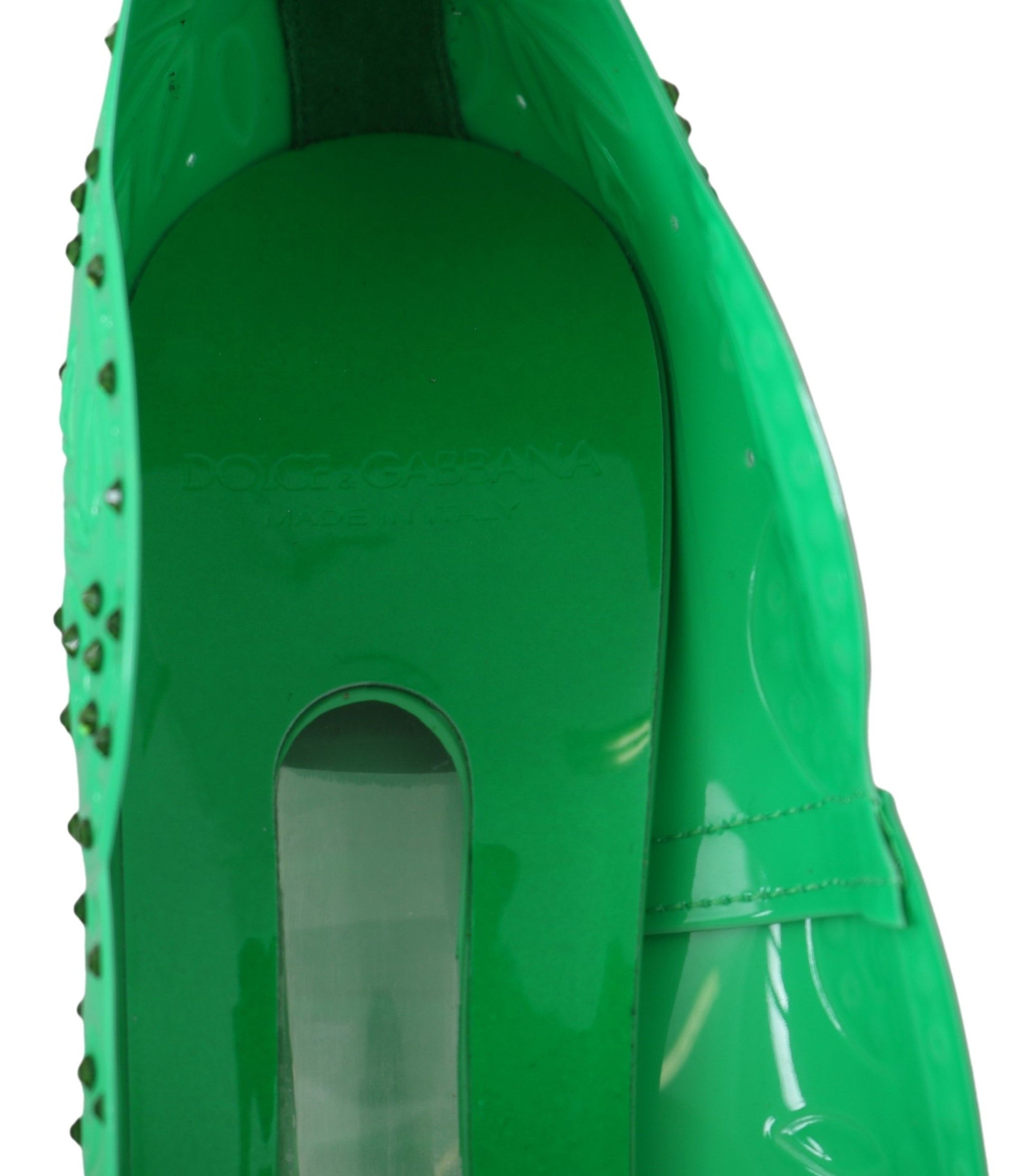 Green shoe with a strap and heel