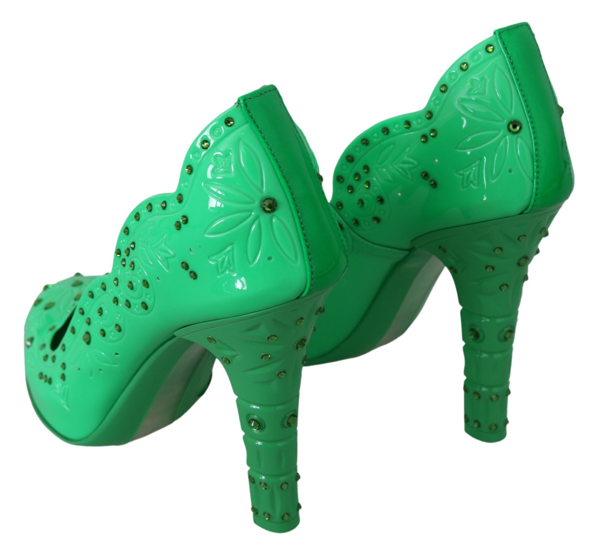 Green high heel shoes with embellishments and straps
