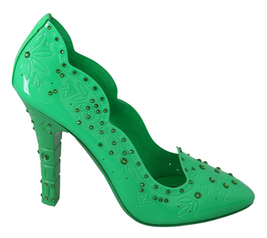 Green high heel shoes with embellishments and straps