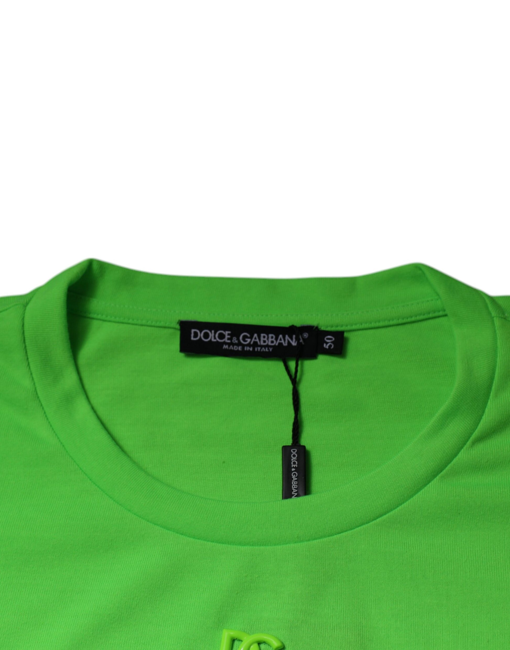 A green crew neck t-shirt with a logo on the front