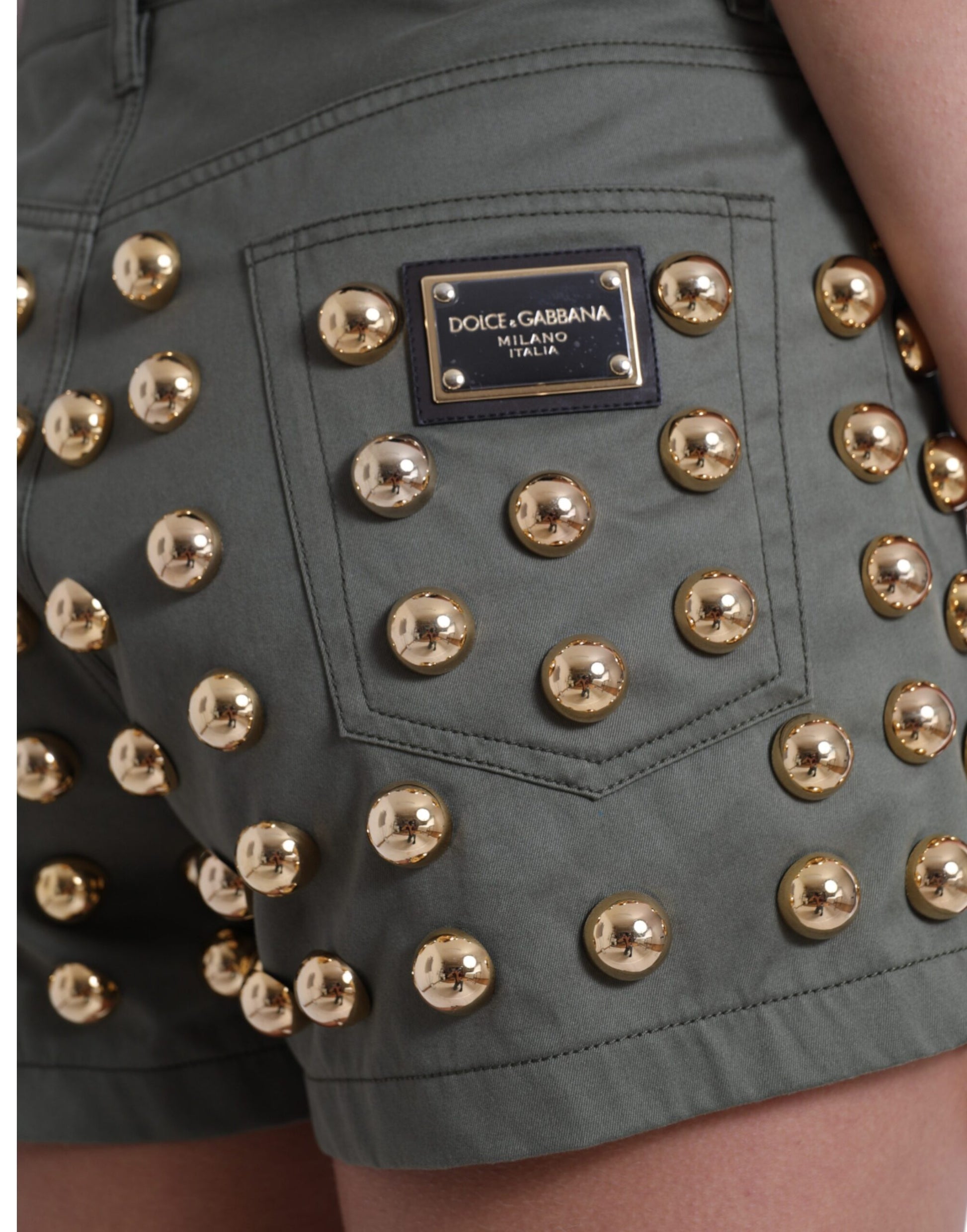 Shorts with gold studs on front pocket