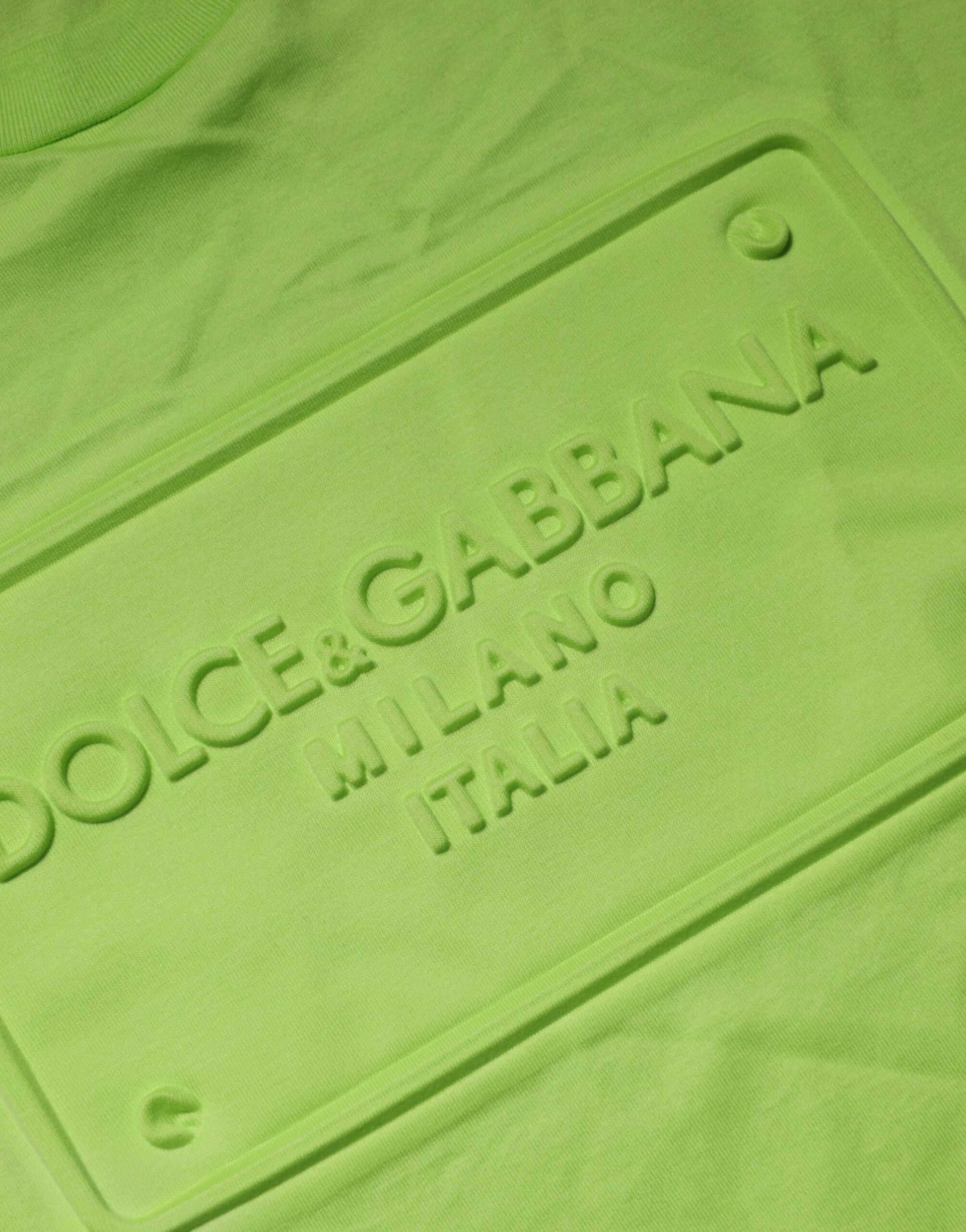 Green shirt with white logo