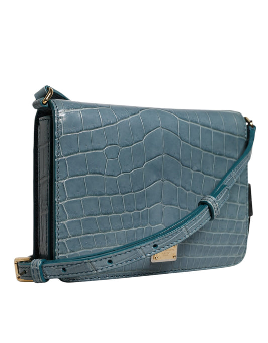 Blue crocodile skin purse with gold accents