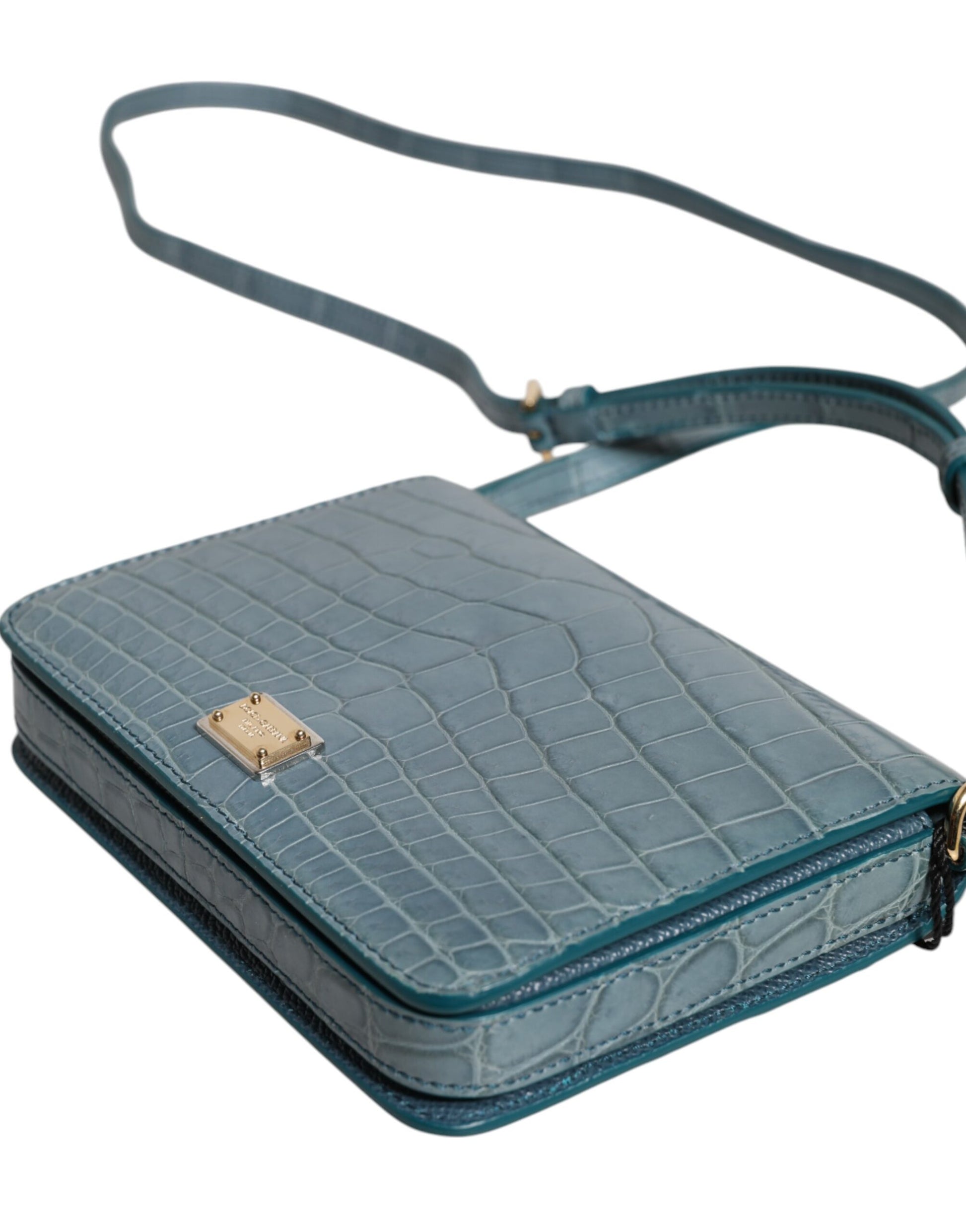 Blue crocodile skin handbag with gold accent