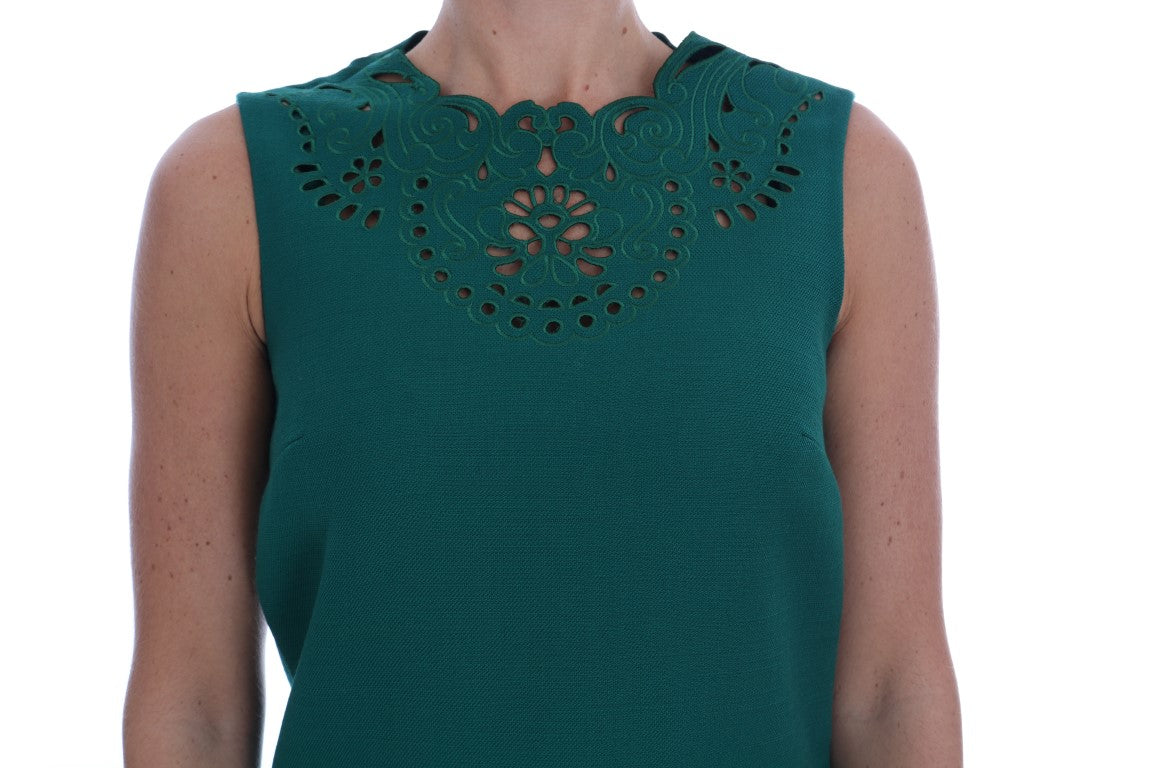 A green floral cutout silk wool dress with short sleeves and a round neckline