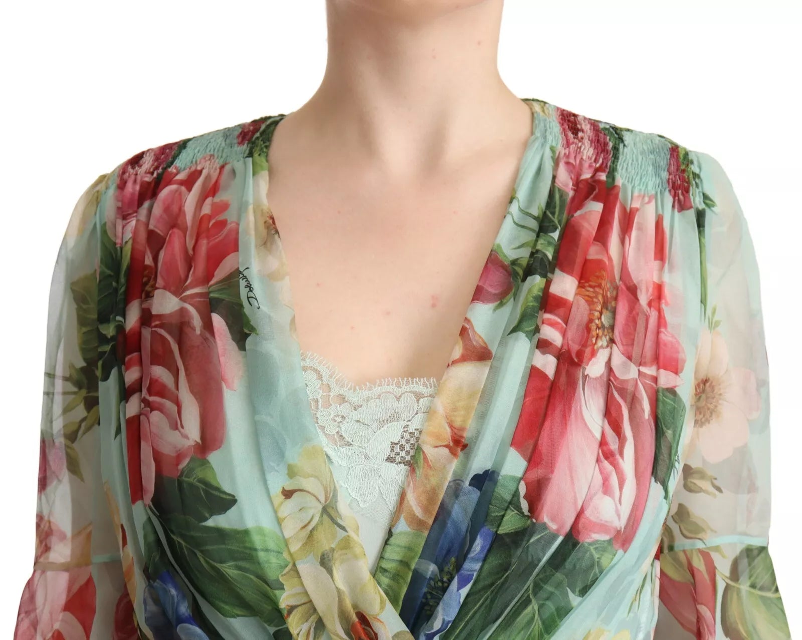 A green floral long sleeve v-neck midi dress