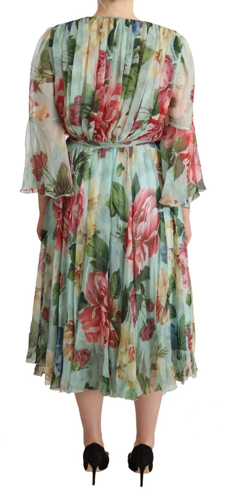 A long sleeve midi dress with a floral pattern and a V-neck