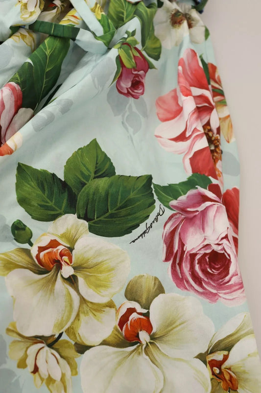 A green floral dress with short sleeves and a v-neck