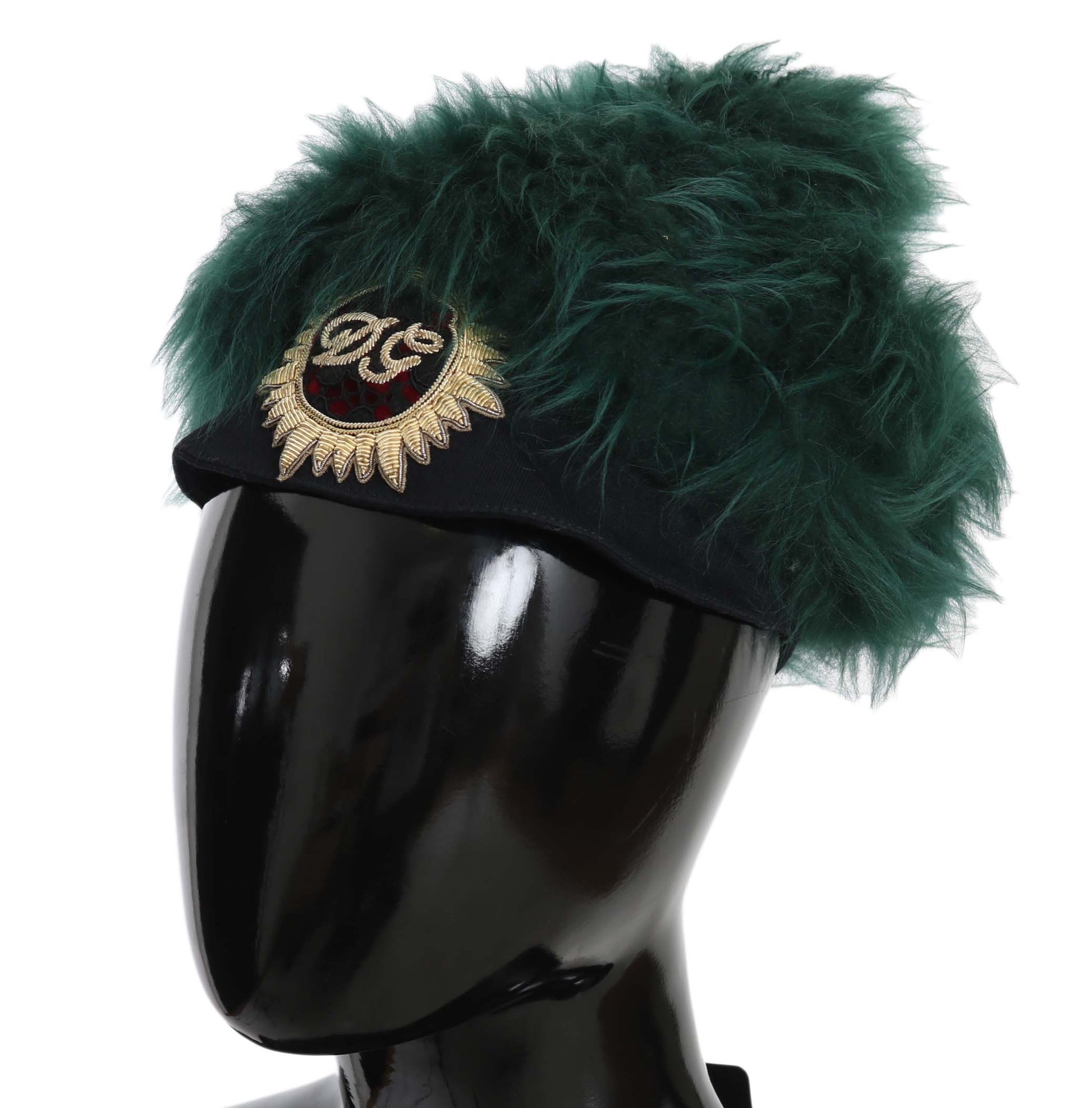 Green feathered headband with gold emblem