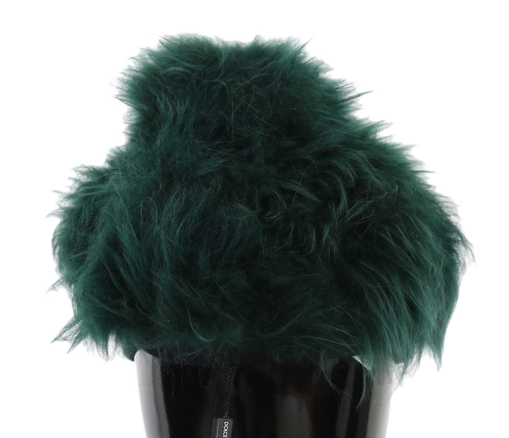 Green fuzzy hat on mannequin head