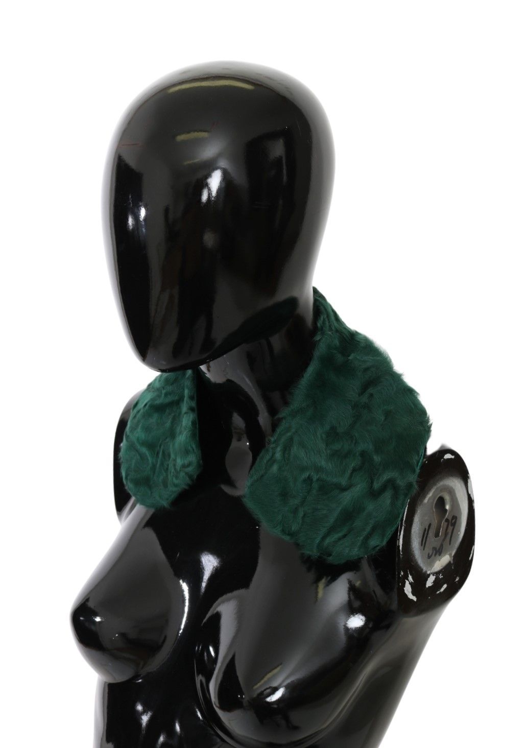 Black mannequin wearing green scarf