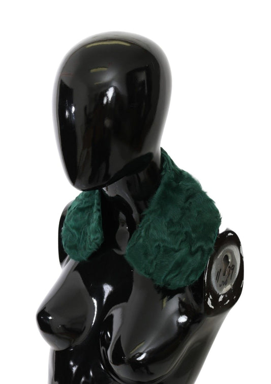 Black mannequin wearing green scarf