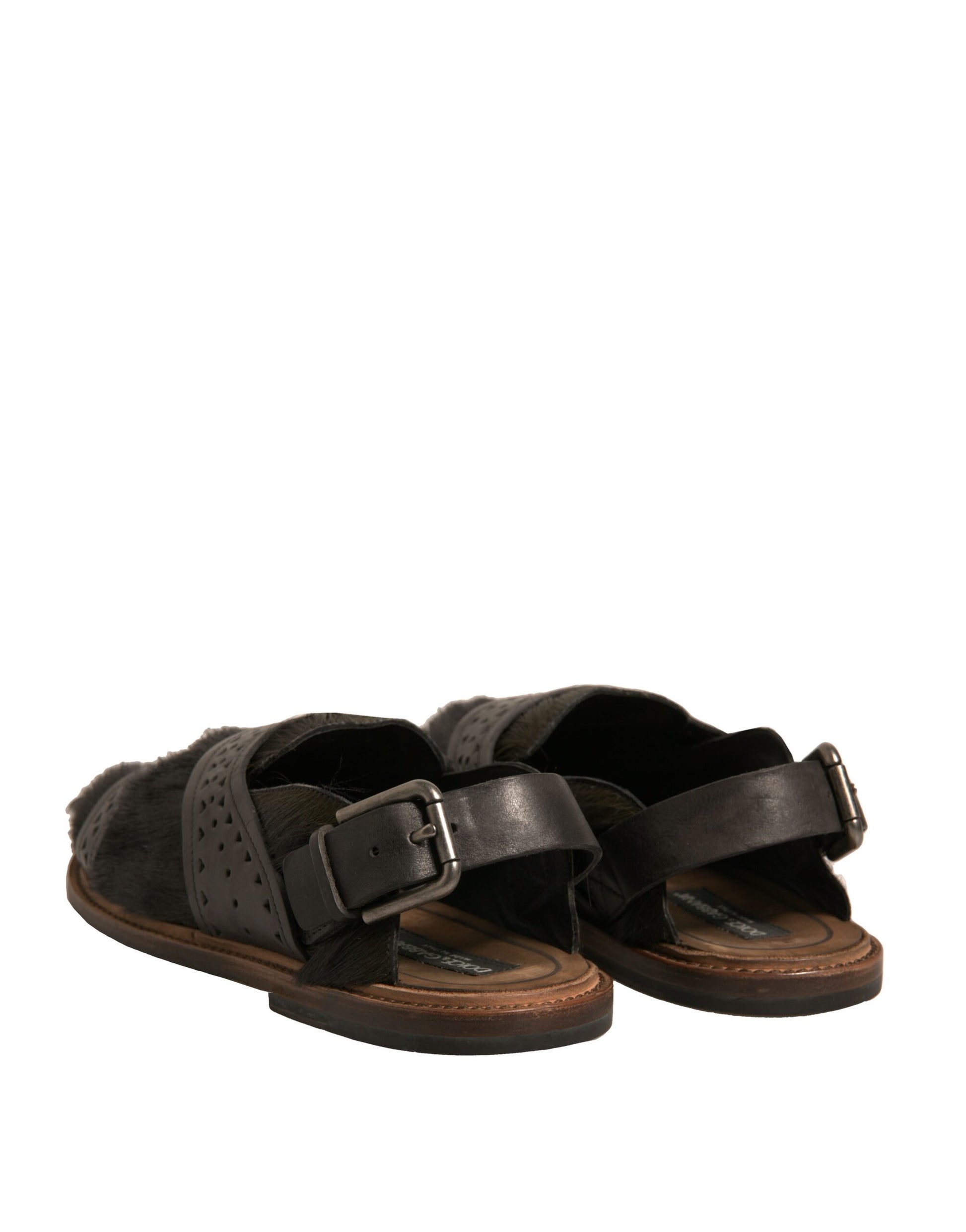 Pair of brown leather sandals with straps