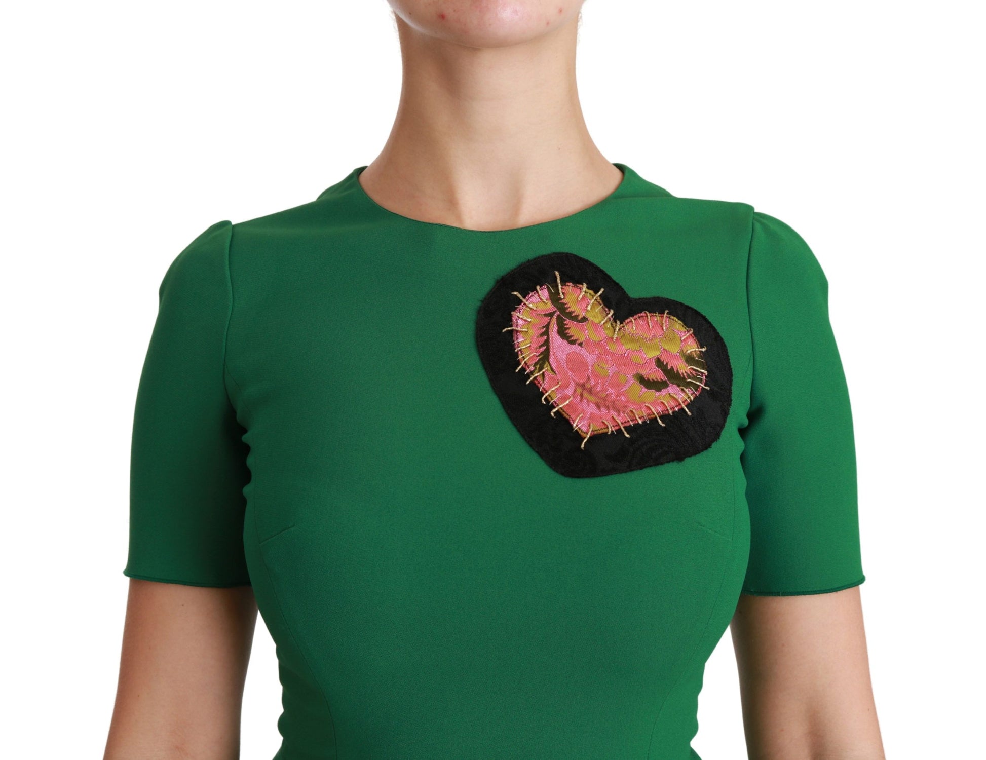A green mermaid midi dress with a heart patch on the chest