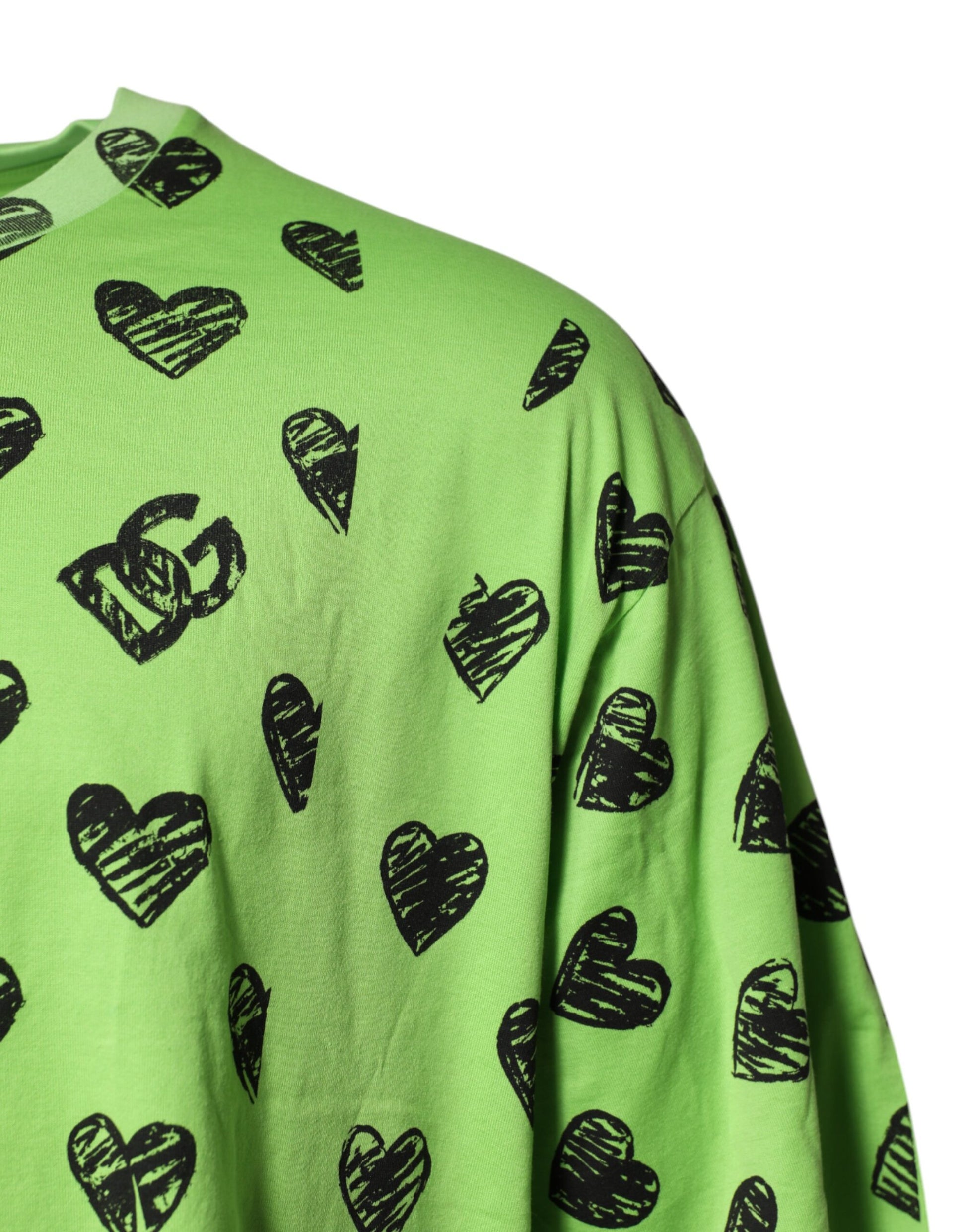 Green sweater with hearts pattern