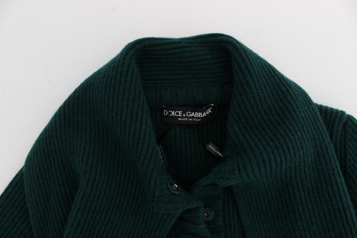 Green knit sweater on hanger