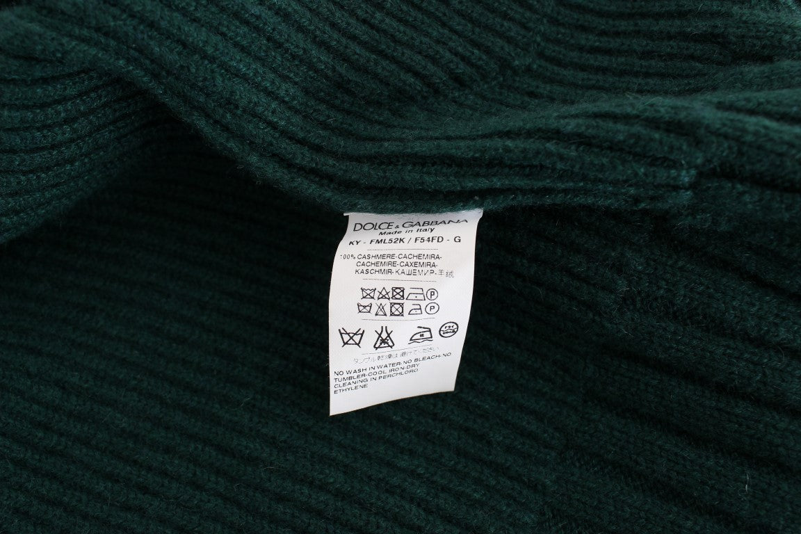 Green knit sweater with tag on neckline