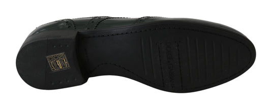 Black shoe with white sole and yellow logo on side