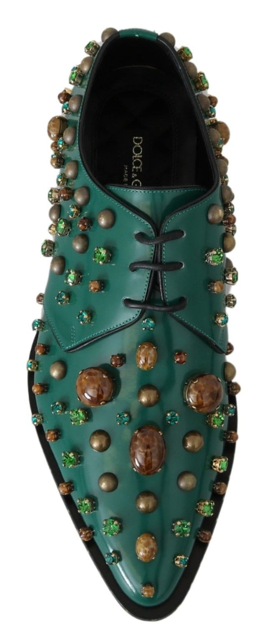 Green shoe with brown and green stones on top