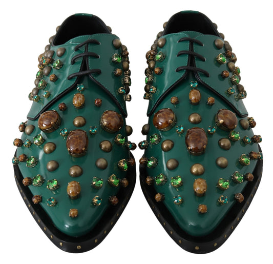 Pair of green shoes with brown and gold embellishments